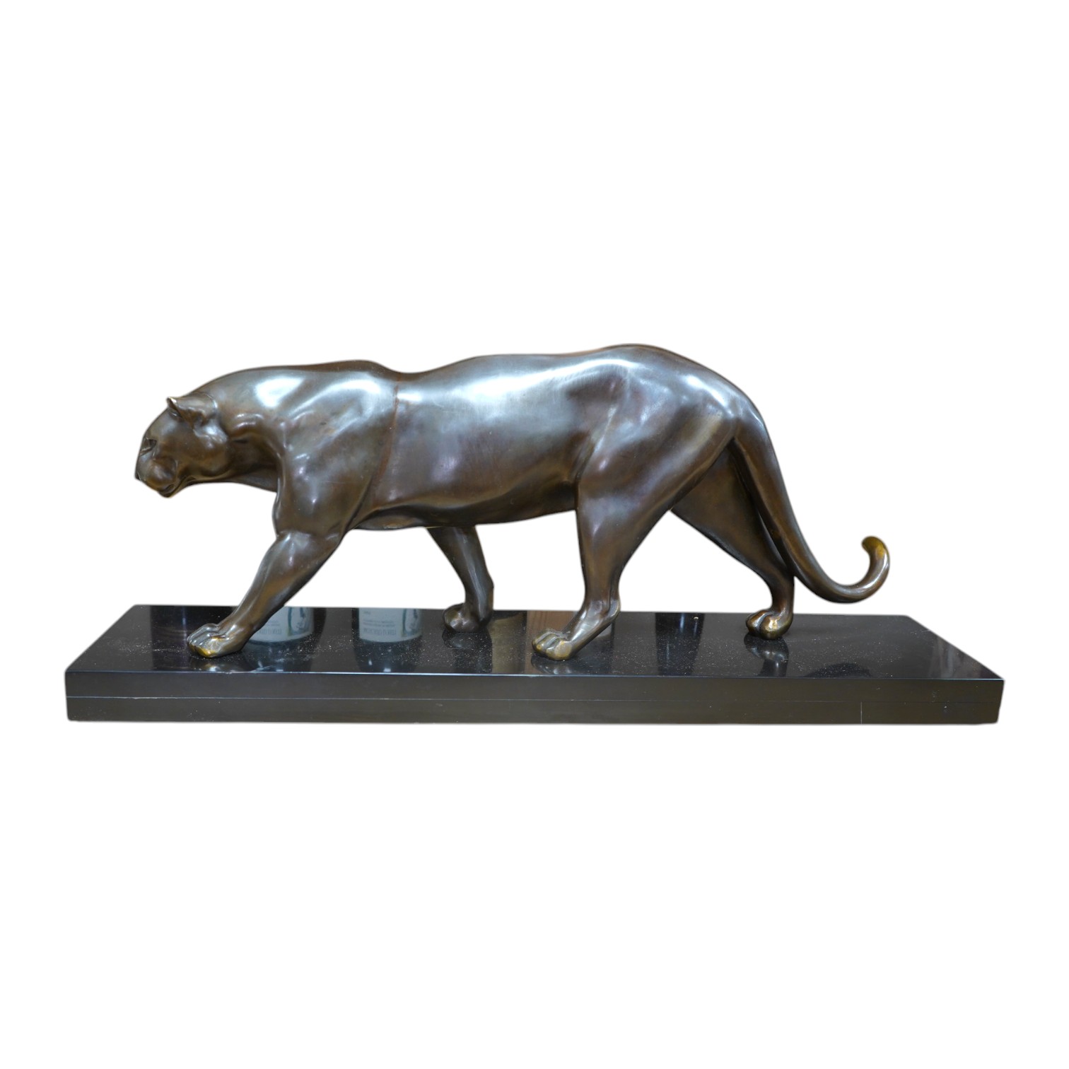 A large French Art Deco bronzed spelter panther, on black marble plinth, 71cm wide at base, 30cm high. Condition - good